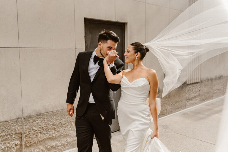 Wedding Couple taking portraits in Downtown Detroit