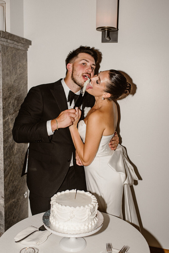 Bride and Groom direct flash moment while cutting the cake