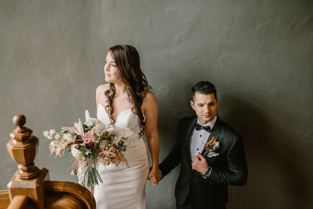 Bride and Groom in Stairwell at Essex Golf Club